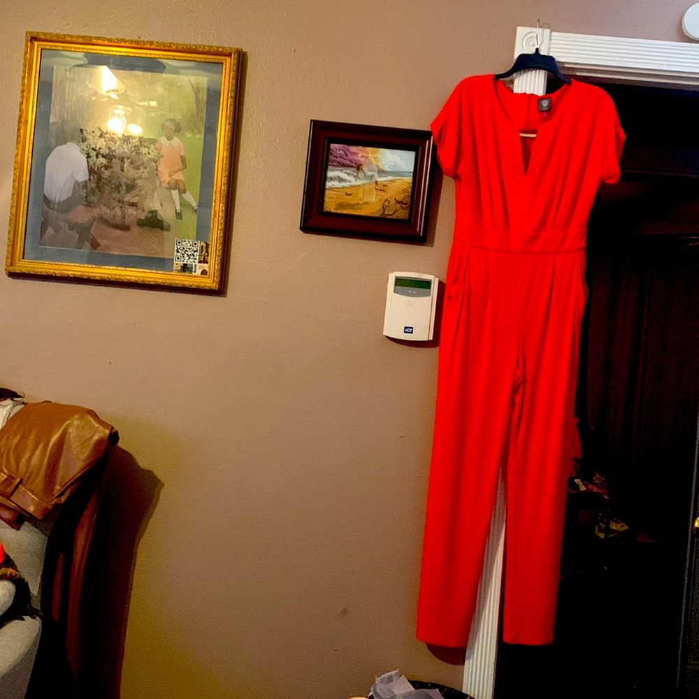 Orange jumpsuit short sleeves with pockets